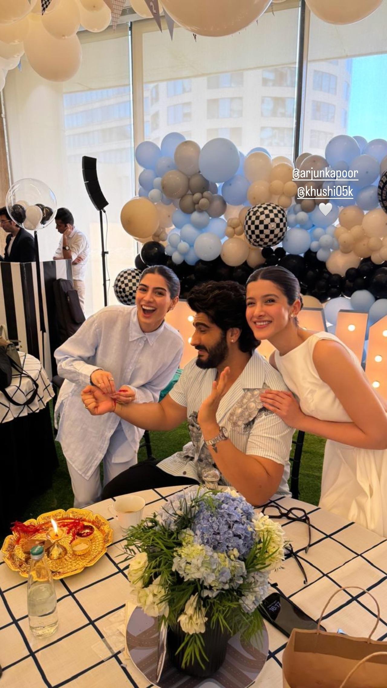 Shanaya and Khushi Kapoor pose with their brother Arjun Kapoor after tying rakhi