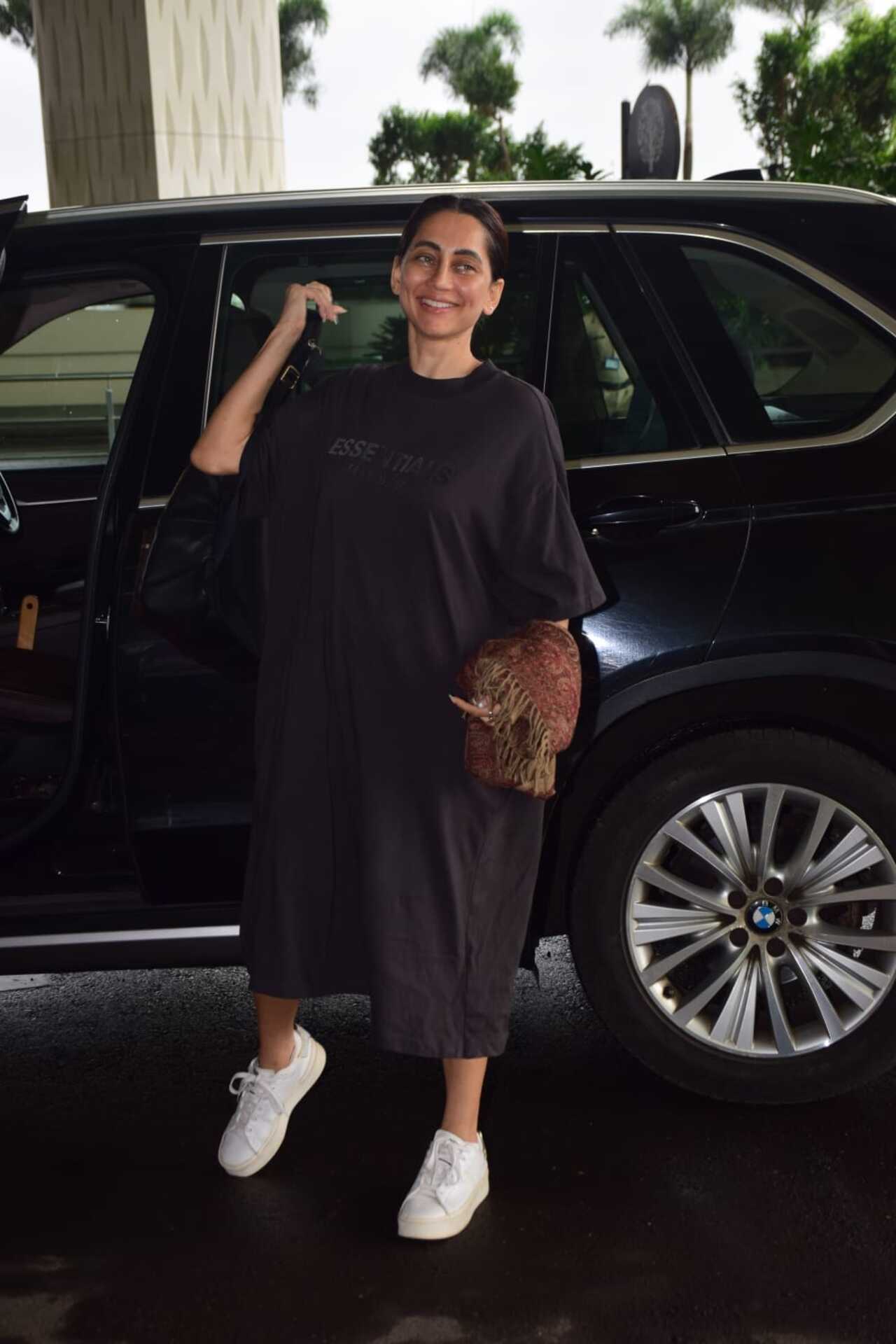 Anusha Dandekar was spotted arriving at the Mumbai airport dressed in a comfortable looking black outfit