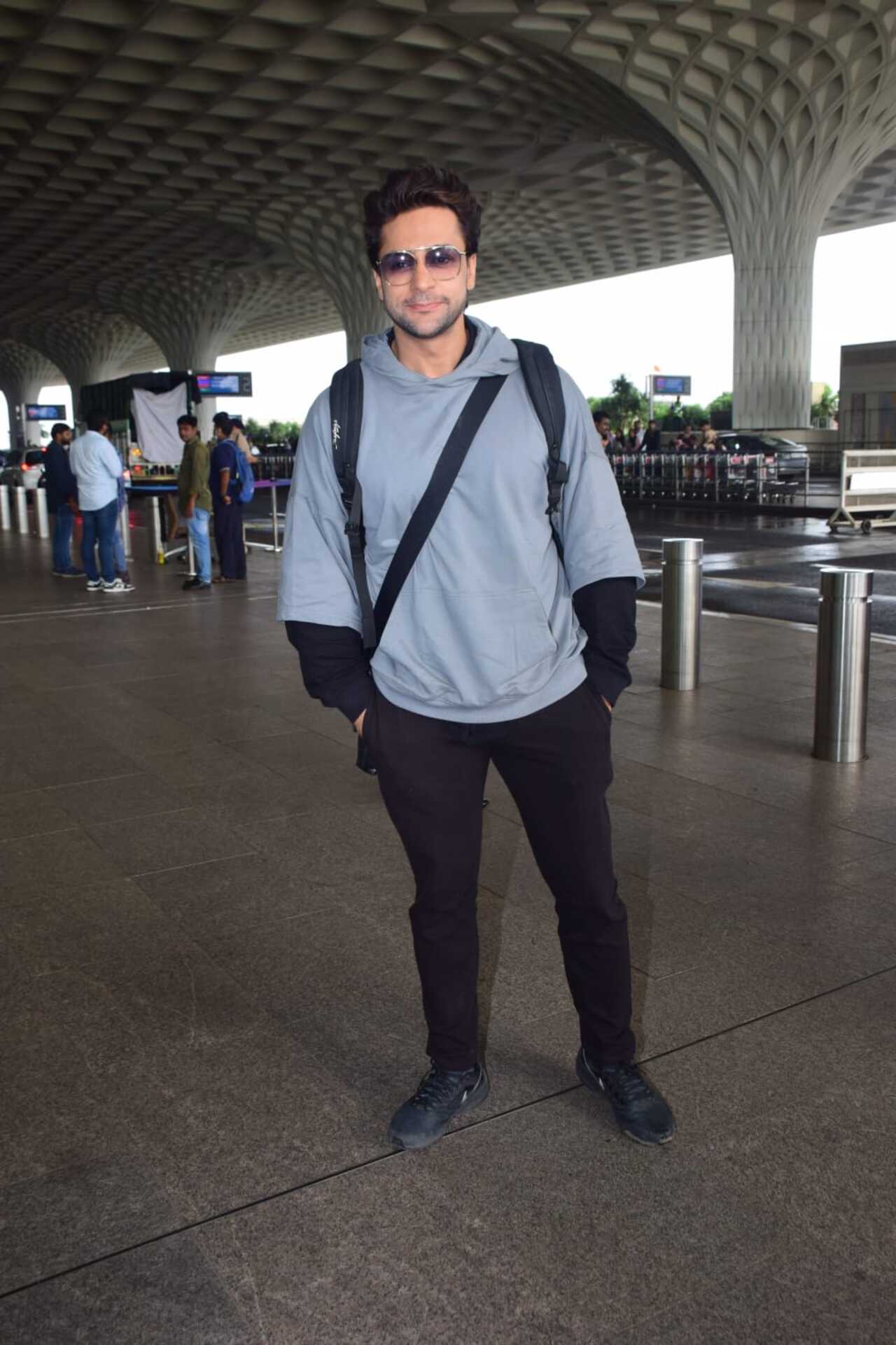 Shalin Bhanot posed for the paparazzi before heading into the airport for his flight