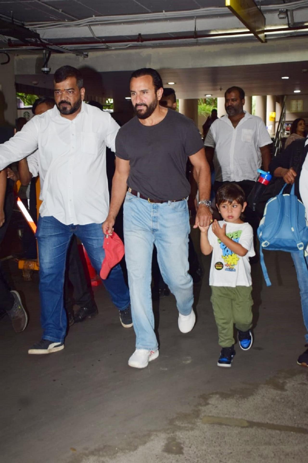 Saif Ali Khan was seen holding Jeh's hand as he walked outside the airport after a long vacation in Europe with his family