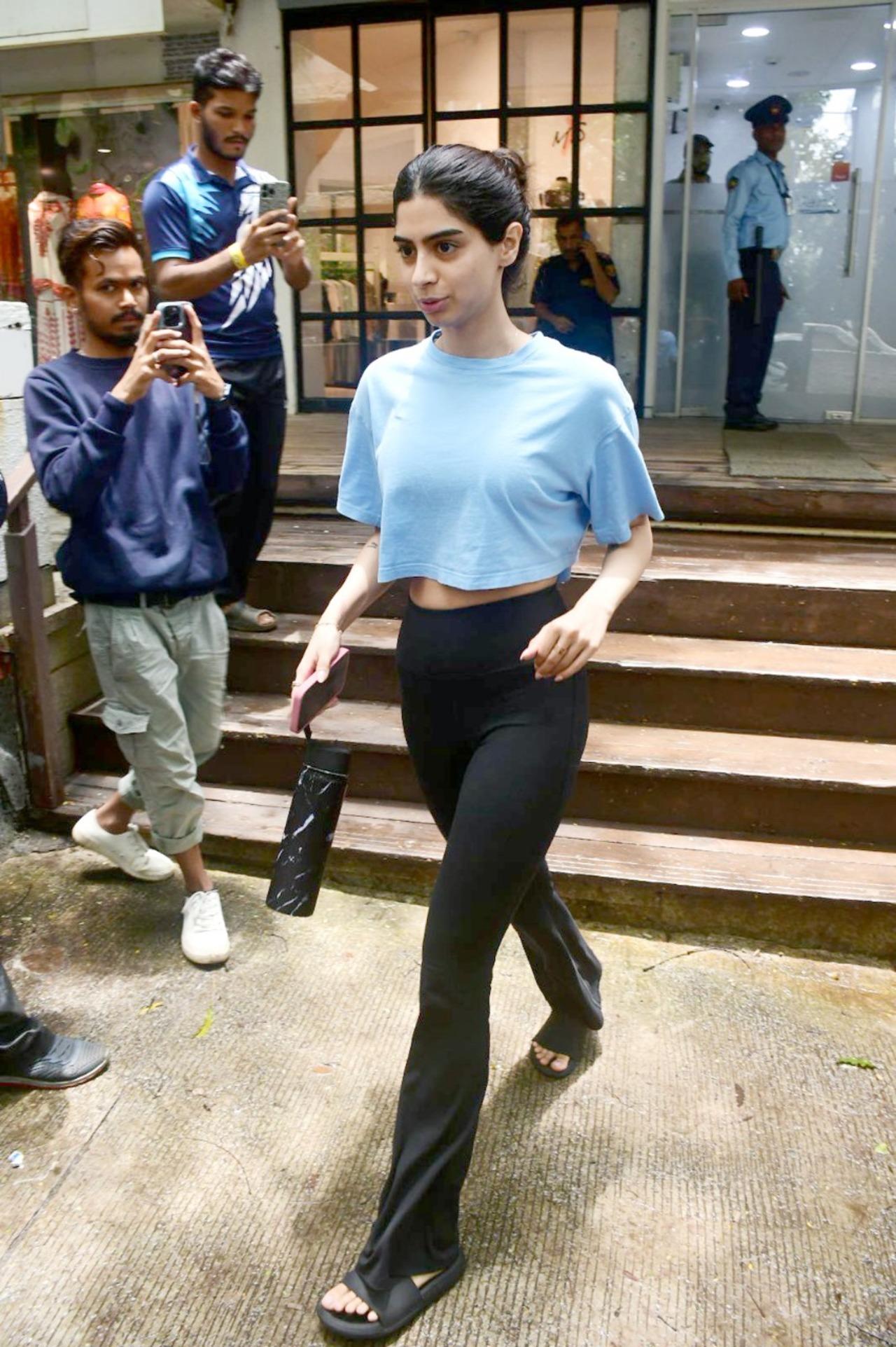 Khushi Kapoor was snapped in the city in a blue t-shirt and black flared pants