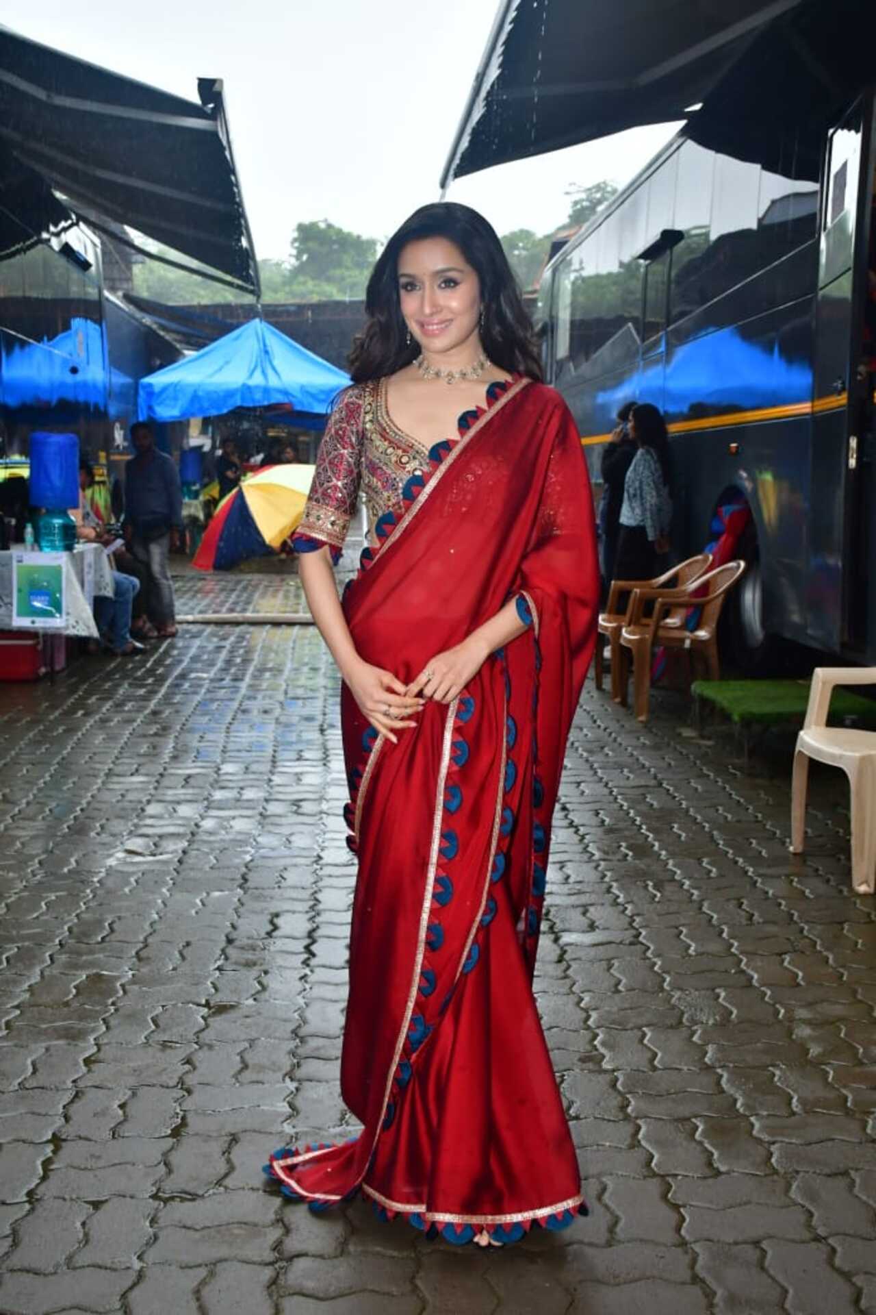 Shraddha was seen wearing a gorgeous red saree and sporting long hair as she stepped out to promote her film in the city