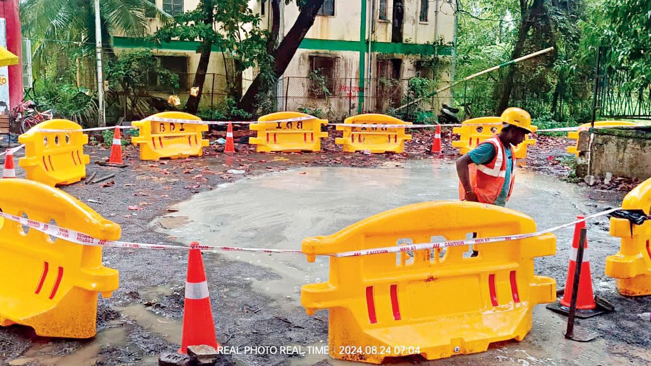 Road caves in at Mumbai's Andheri East