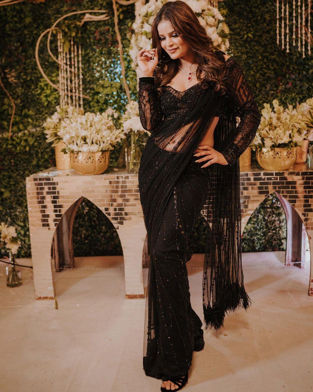 We know December is far, but keeping things handy is always a good option. Buy a stunning black saree just like Archana's and slay like a queen!
