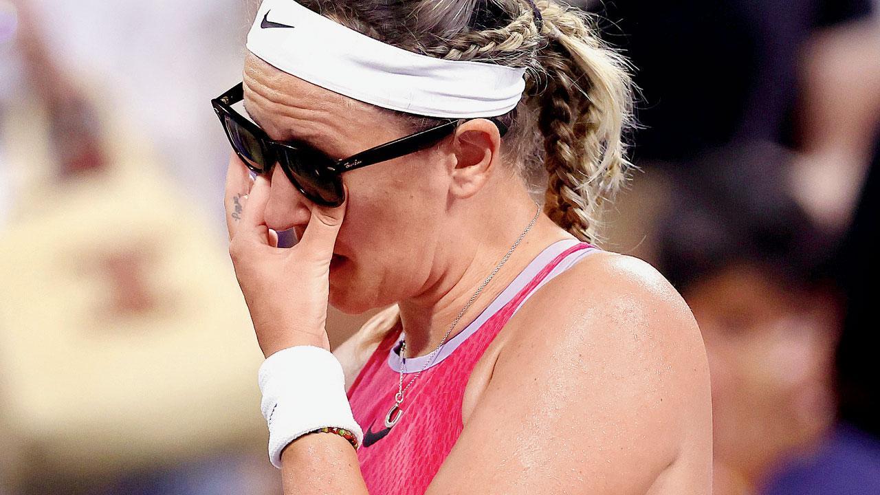 Sunglasses help tearful Azarenka ease migraine