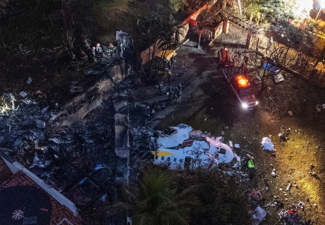 Brazilian television network GloboNews showed aerial footage of an area with smoke coming out of an obliterated plane fuselage