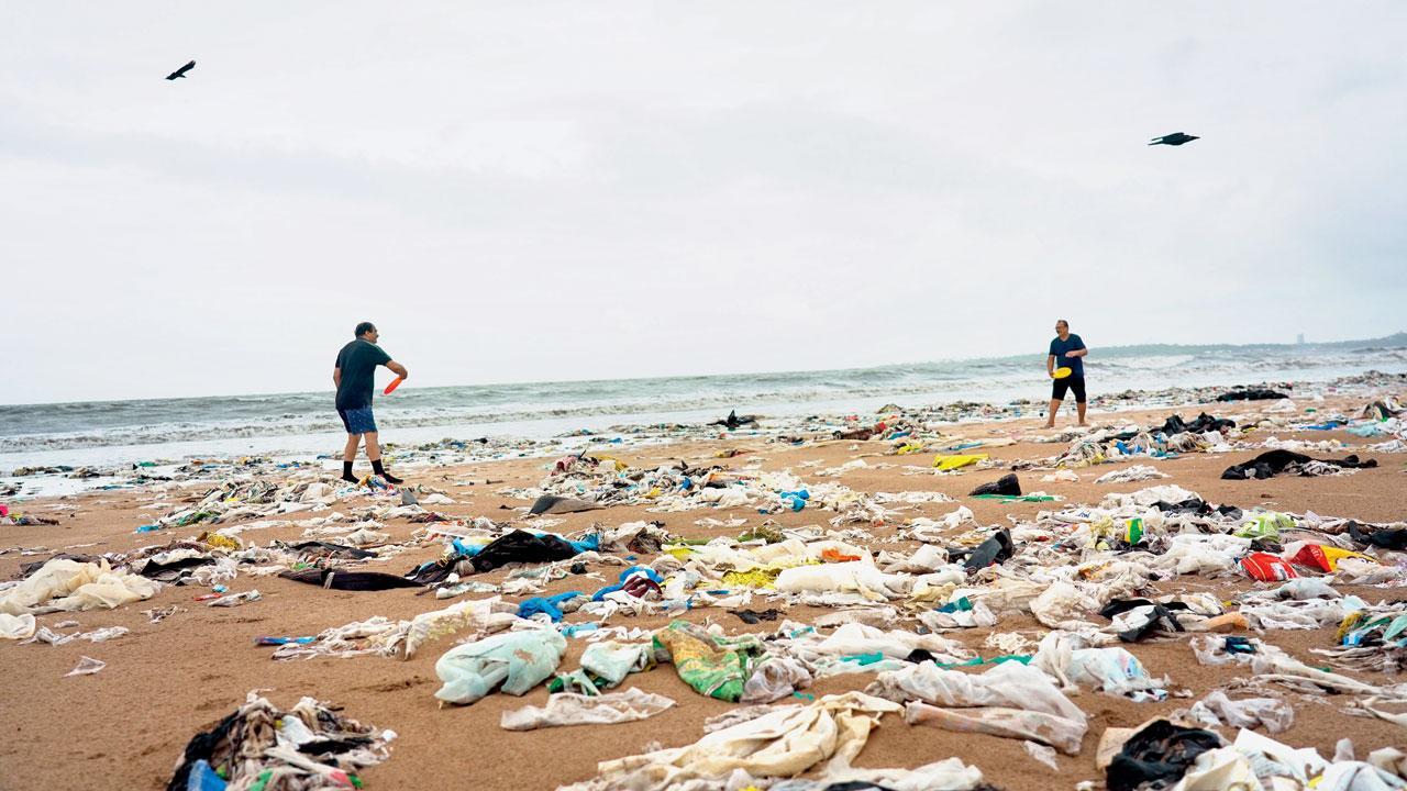 Why is Mumbai's Juhu beach covered in garbage