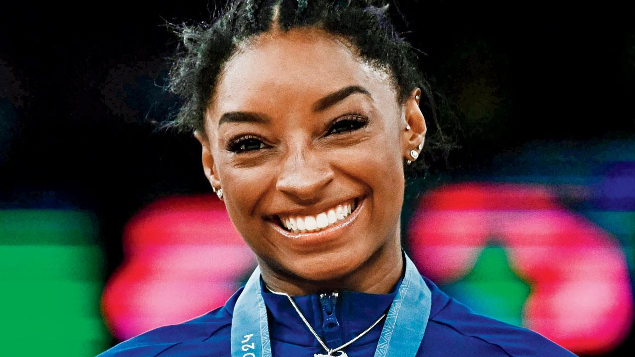 Biles reclaims all-around crown