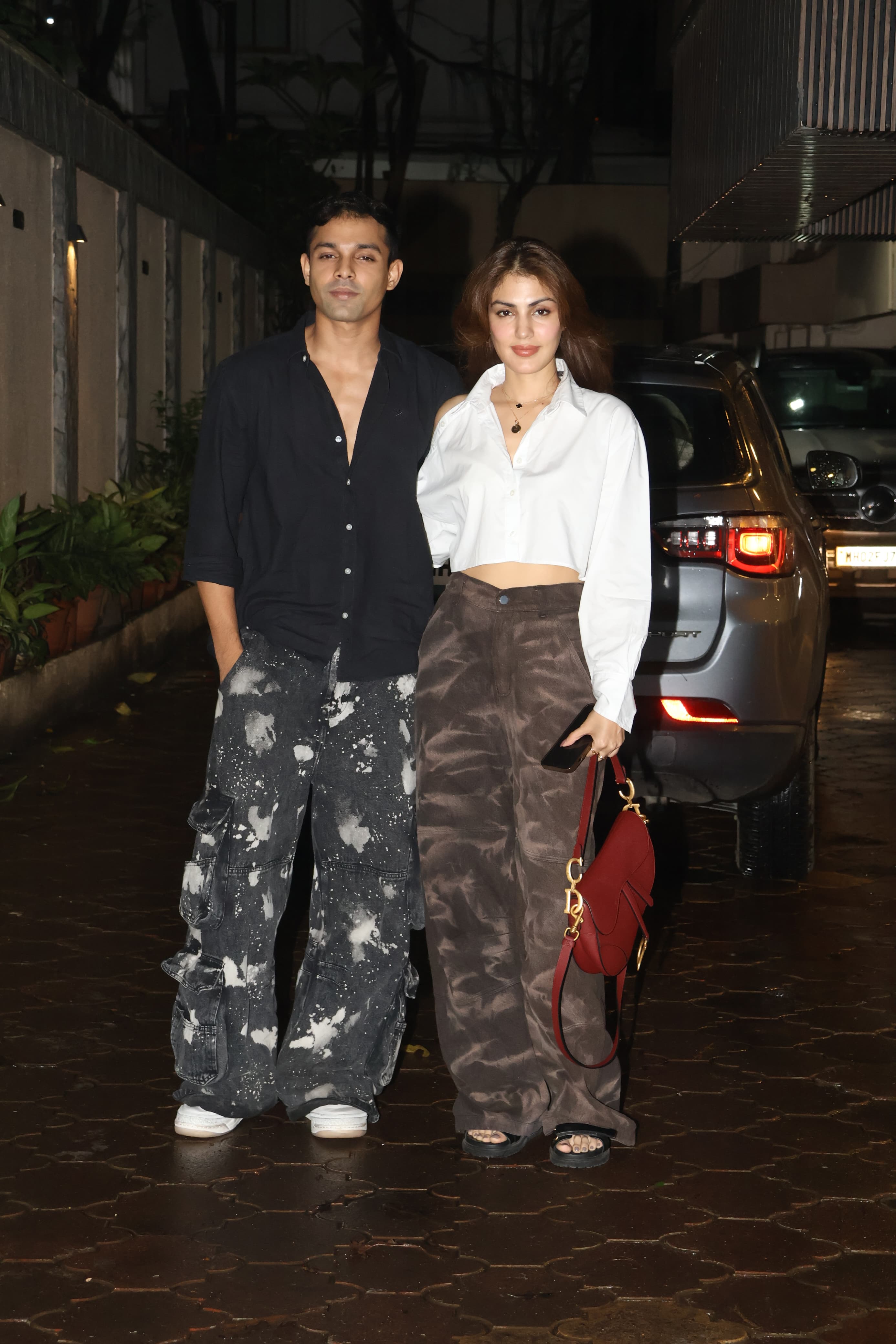 She was accompanied by her brother, Showik Chakraborty. They both posed together for the cameras