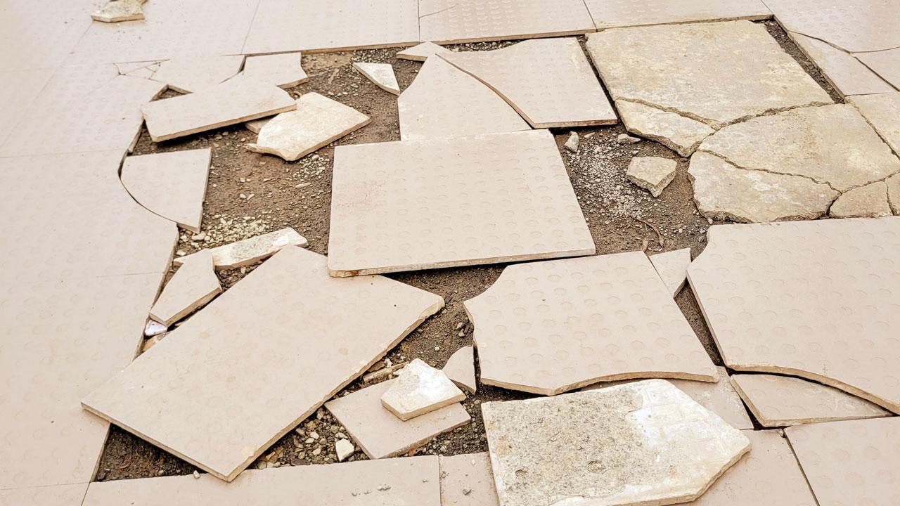 Mid-Day Impact | Mumbai: Loose tiles on Charni Road FOB removed