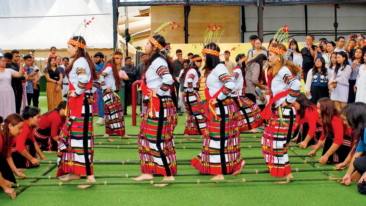 Local artistes perform Cheraw at the pineapple festival in Bandra