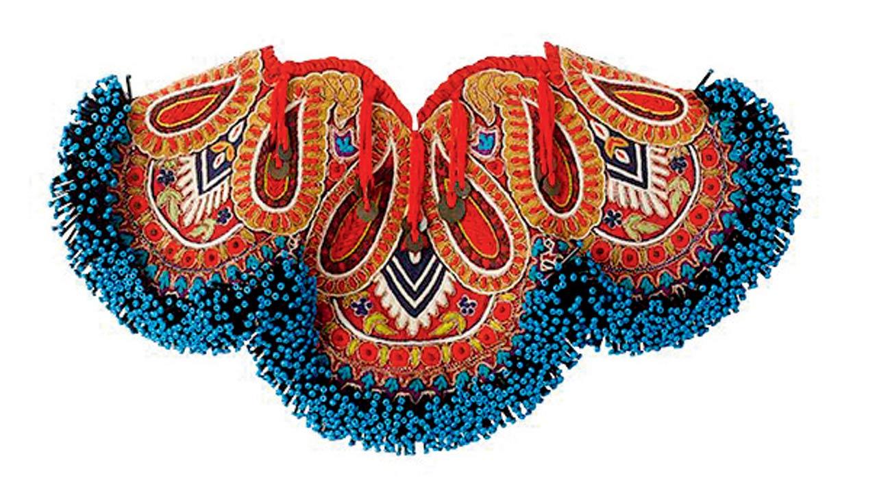 A paisley-embroidered bead collar necklace, priced at `8,999, is a brilliant way to elevate any basic T-shirt, plain shirts or dresses
