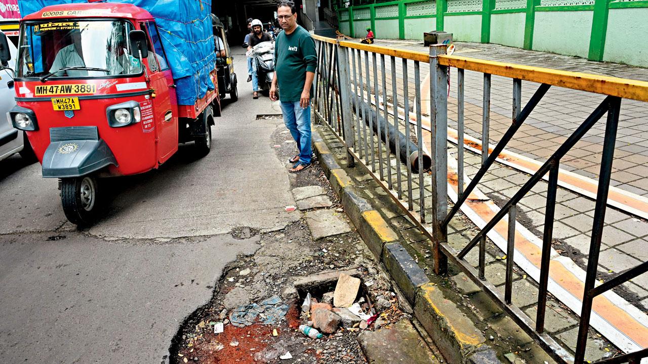 A broken drain, which poses a threat to motorists