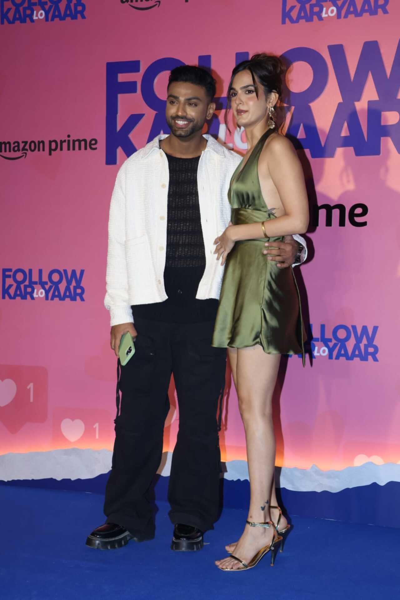 Rushali Yadav and Harsh posed together at the blue carpet