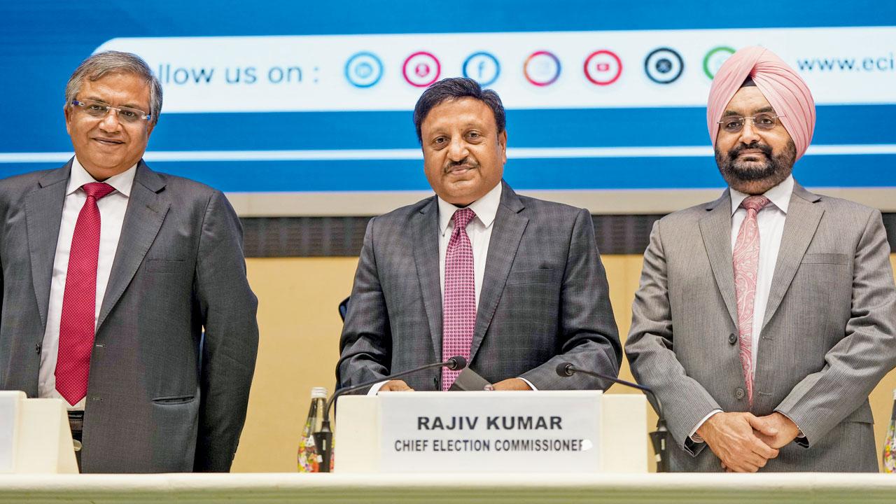Chief Election Commissioner Rajiv Kumar with Election Commissioners Gyanesh Kumar and Sukhbir Singh Sandhu during the press conference. Pic/PTI