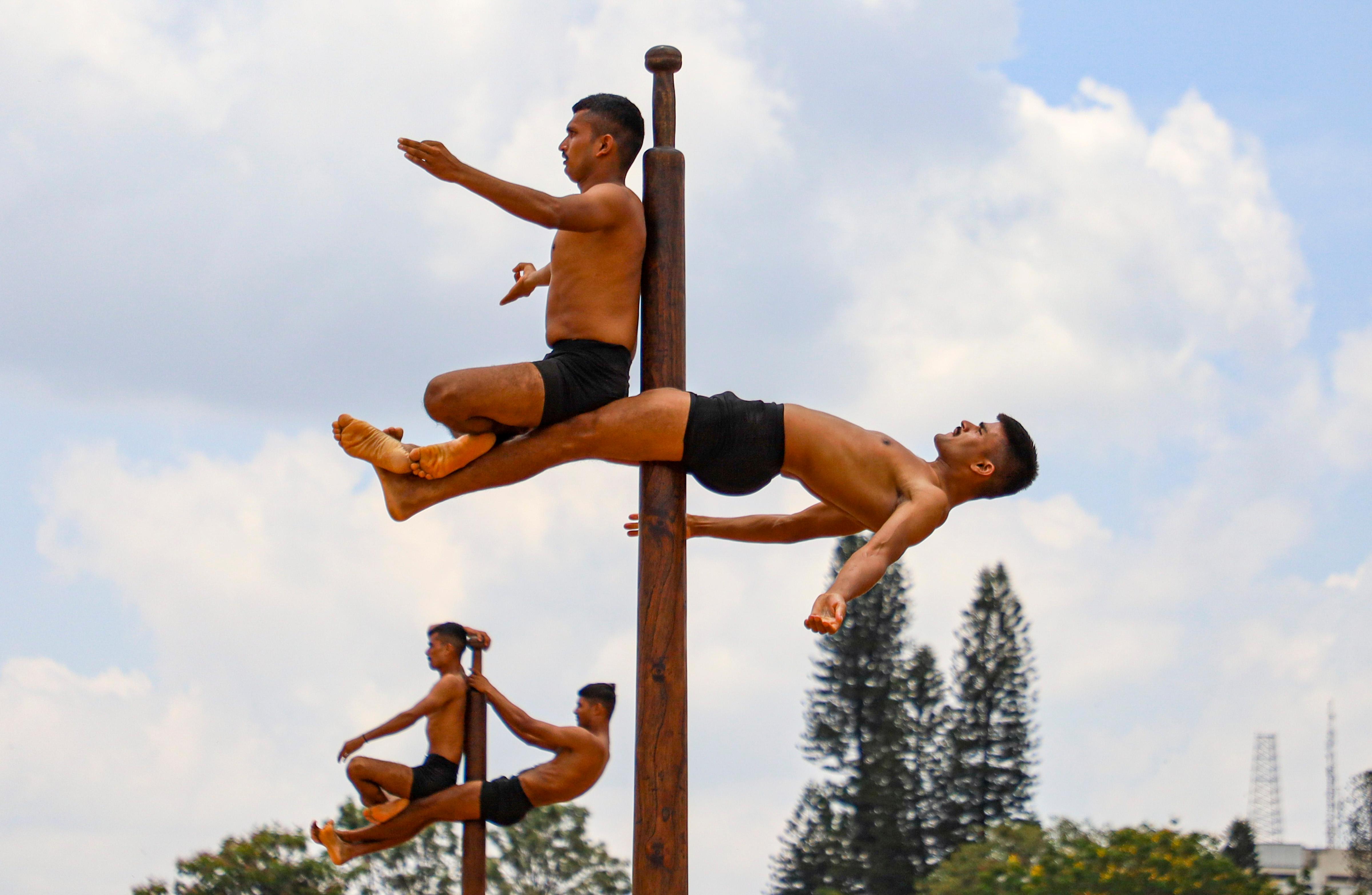 Malkhamb skills being displayed during rehearsal for the Independence Day celebrations, at Manekshaw Parade Ground, in Bengaluru, on Tuesday
