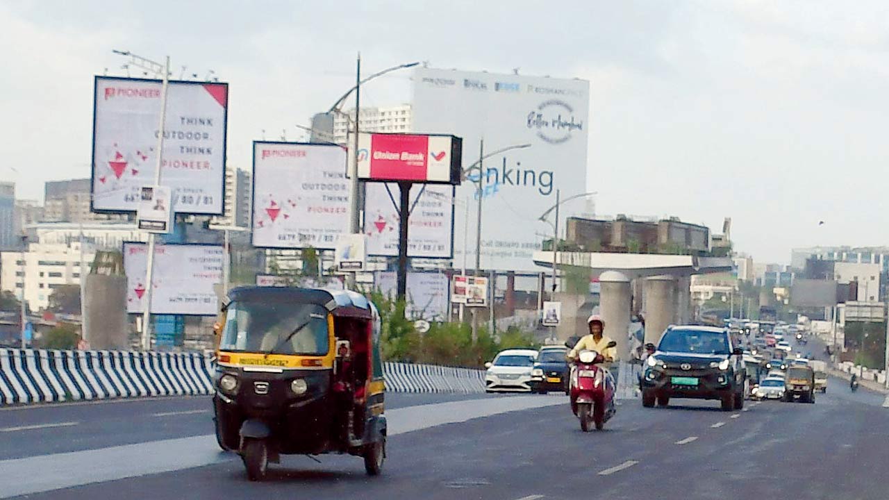 The same hoarding displaying an ad