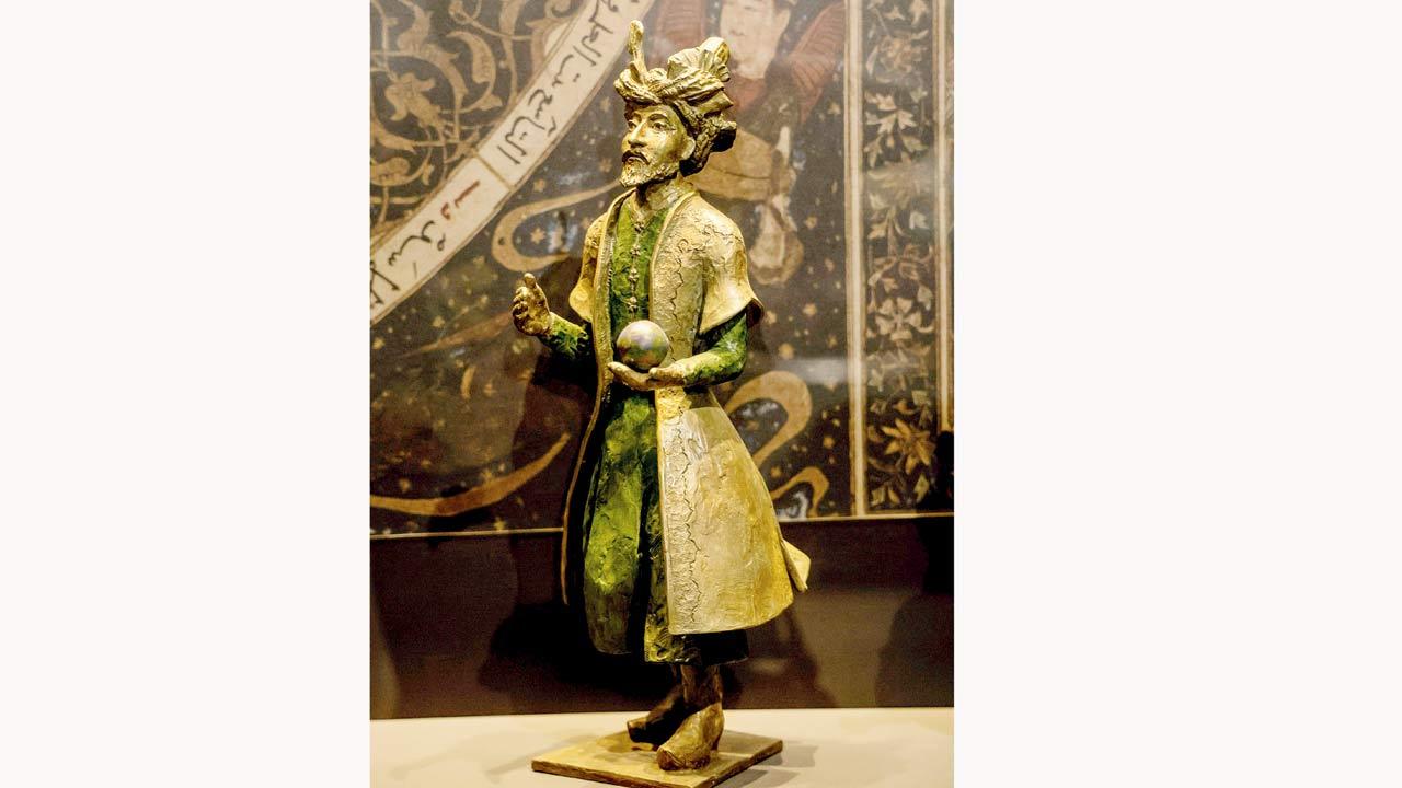 Humayun wearing green on Friday. Sculpture  by Jill Watson 