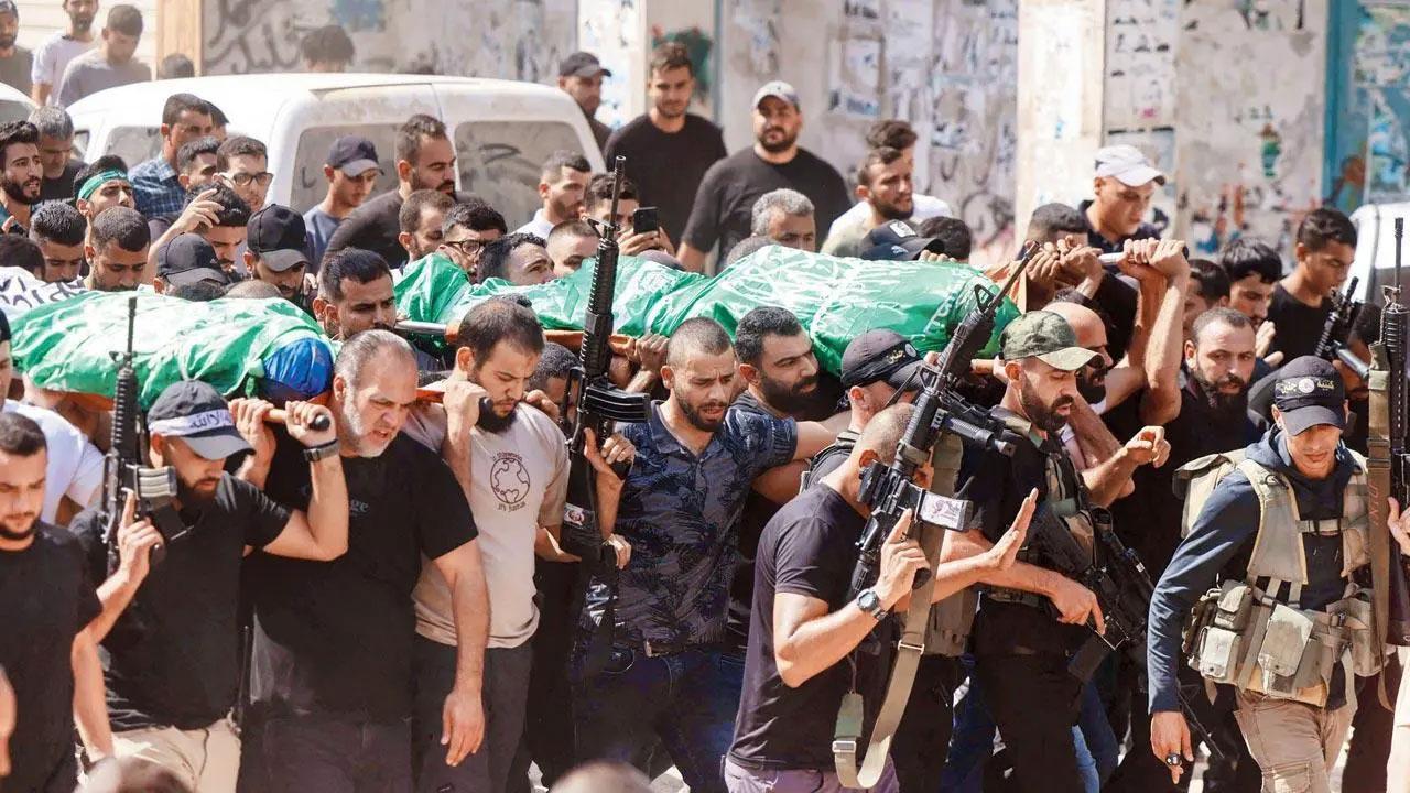 Israel says it is staging airstrikes inside Lebanon targeting Shiite militia Hez