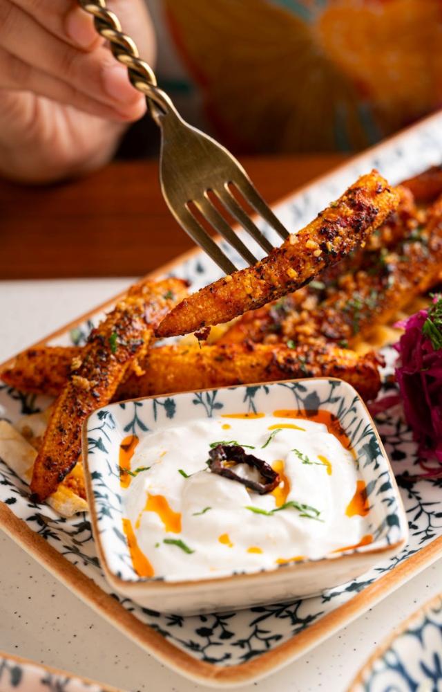 The Chargrilled Baby Corn offers a smoky, savory treat that emphasises the vegetable’s natural sweetness
