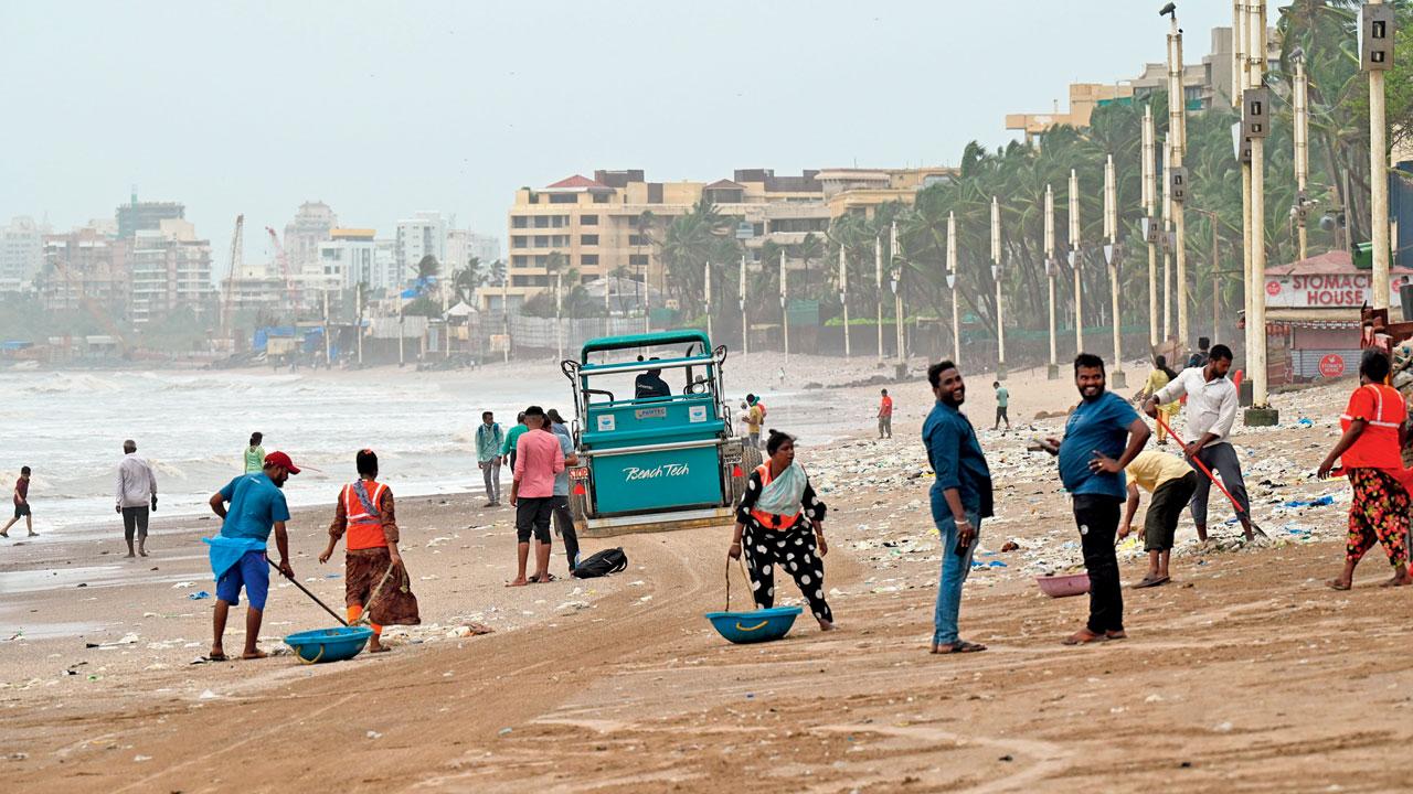 BMC workers cleaning the beach. Pic/Satej Shinde