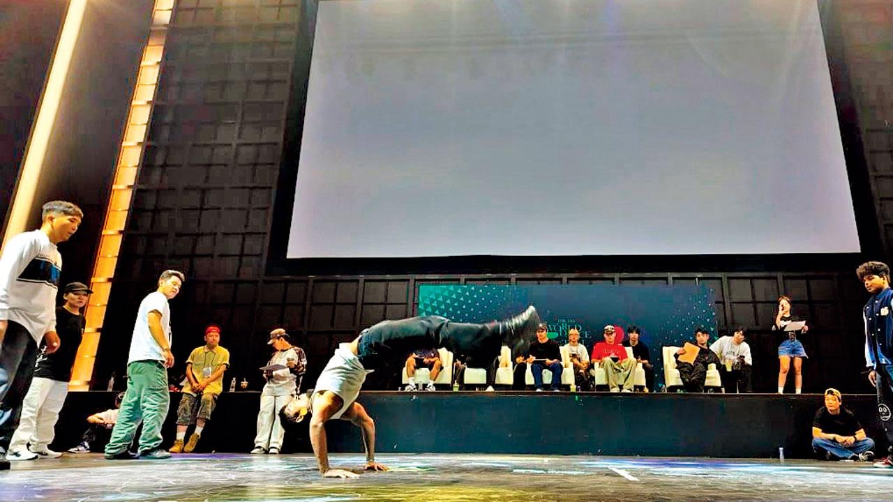 Ramesh Yadav aka B-boy Tornado performs at the tournament in South Korea