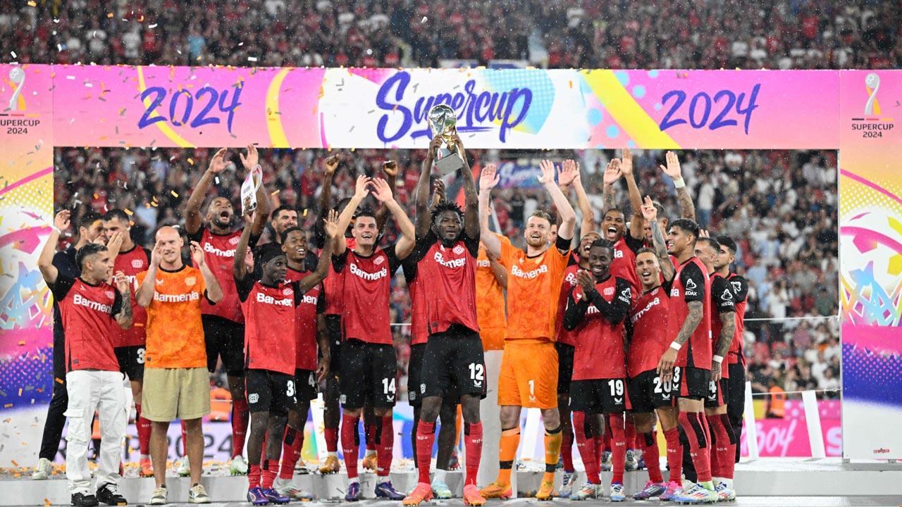 10-man Leverkusen beat Stuttgart on penalties to lift Supercup