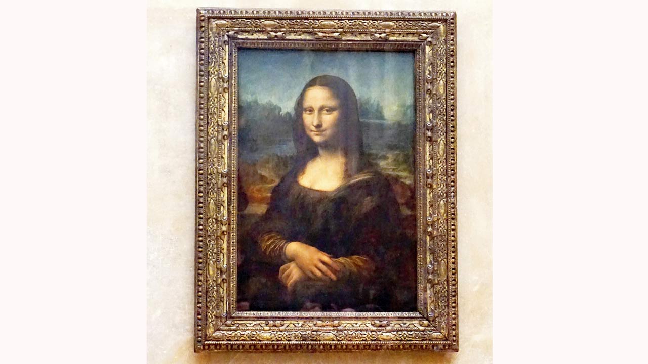 The Mona Lisa is a coveted attraction at The Louvre.