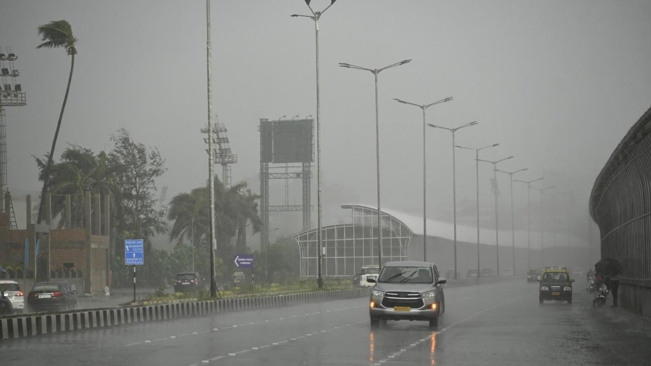 In Photos: Mumbaikars enjoy the unexpected showers at Marine Drive in Mumbai
