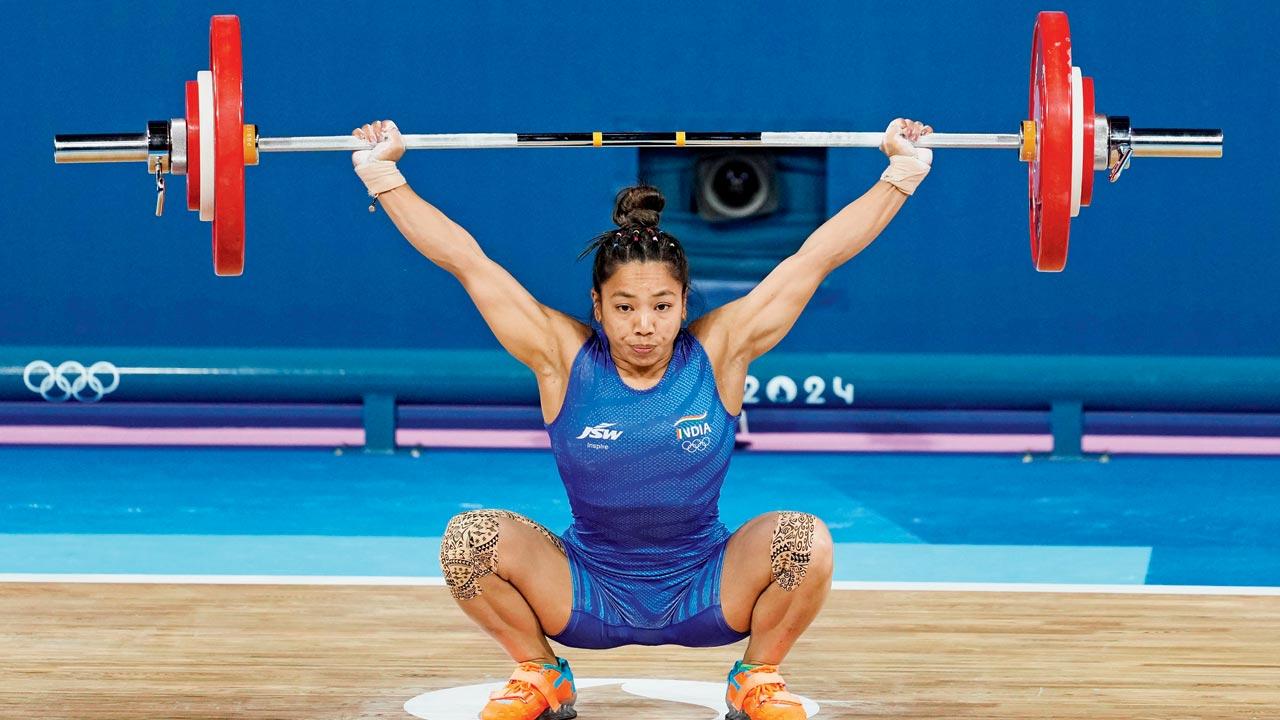 Mirabai Chanu competes in the 49kg event