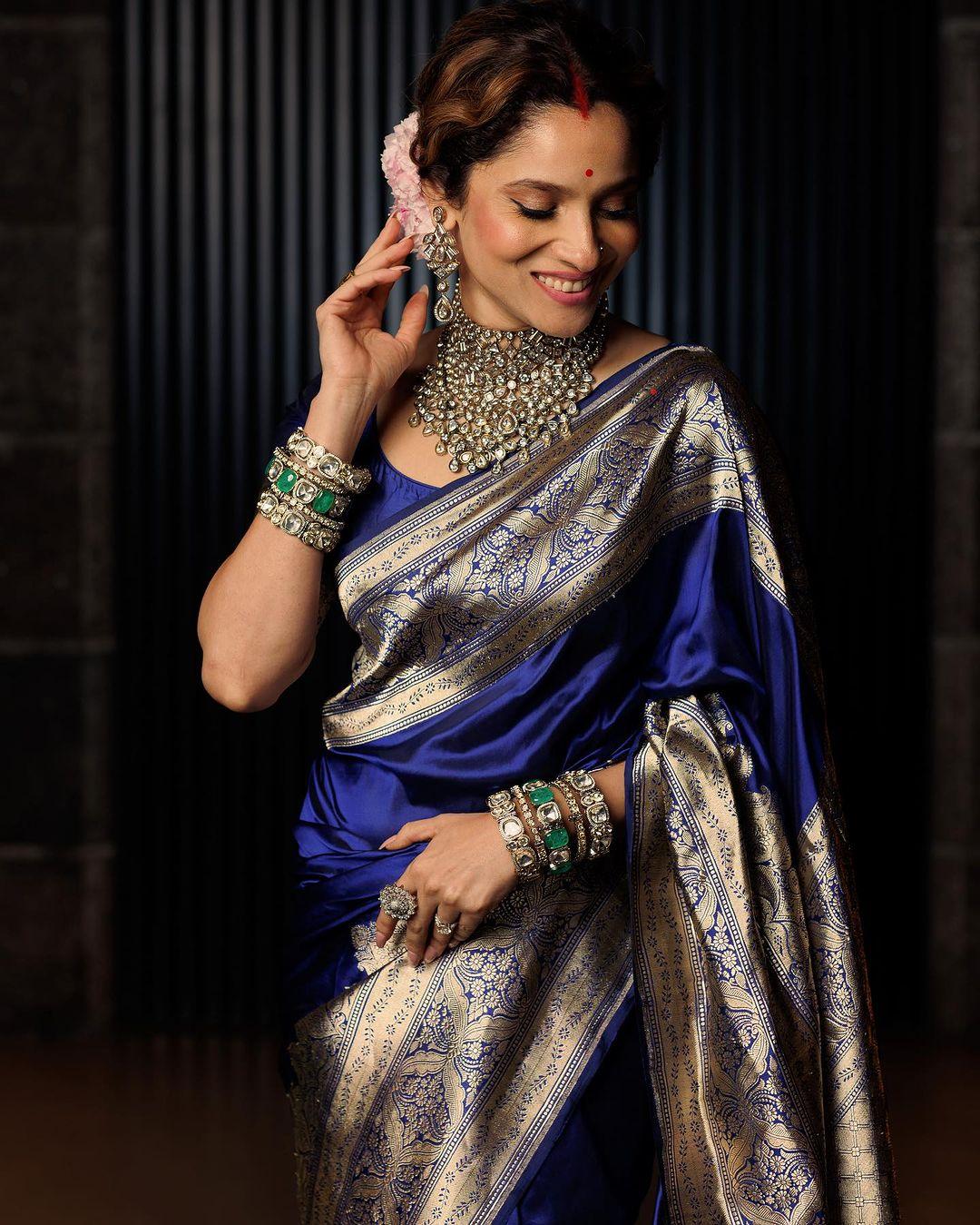  Ankita looked stunning, with her hair tied in a bun decorated with a gajra