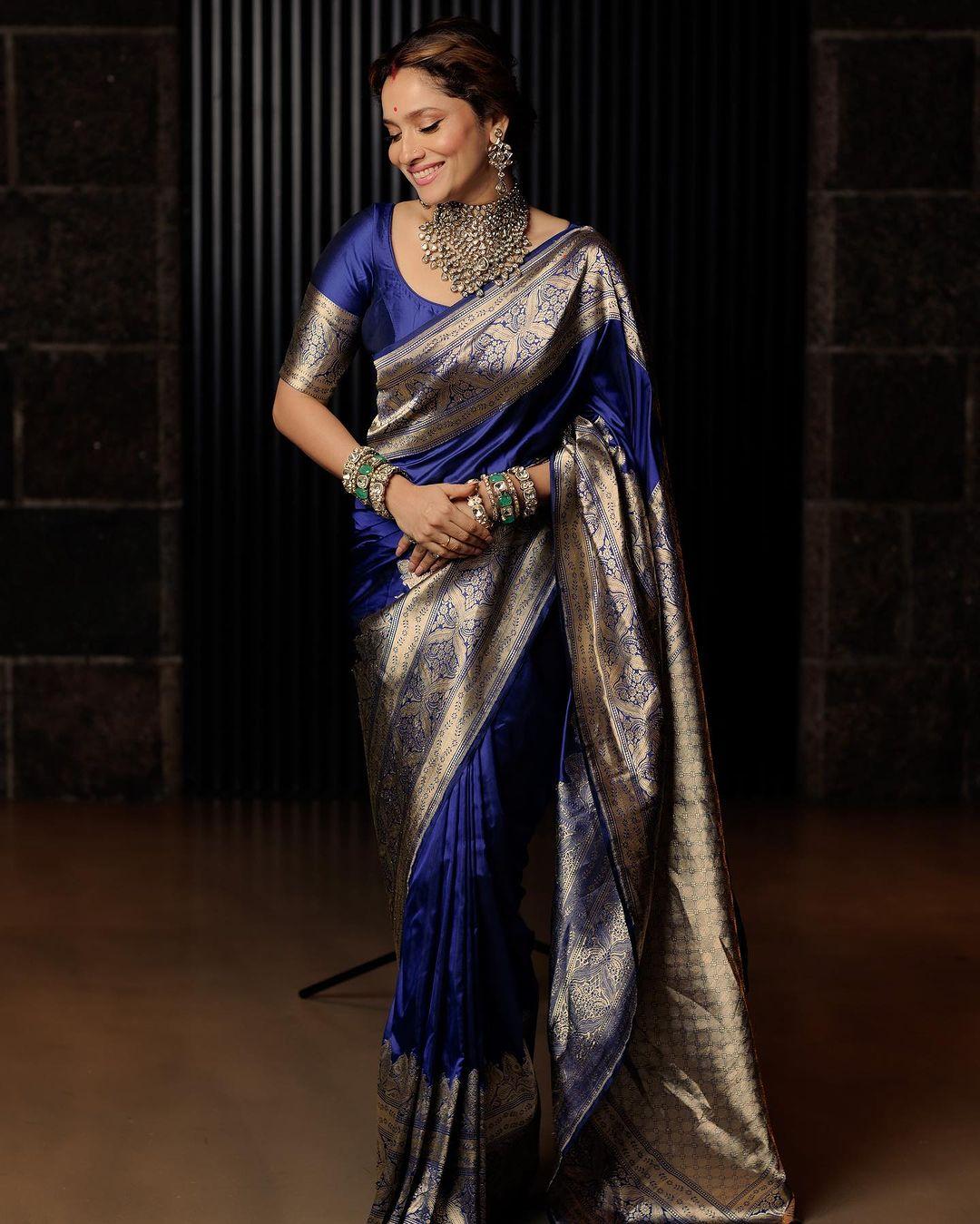 Ankita Lokhande's saree collection is something to look at for inspiration. For this Nag Panchami, consider this blue saree with a broad silver contrasting border