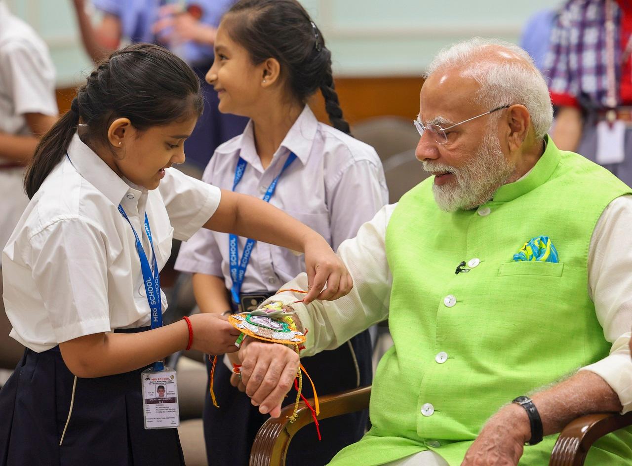 In the video, school girls were seen tying the 'Rakhi' to PM Modi, on the festival of 'Raksha Bandhan'