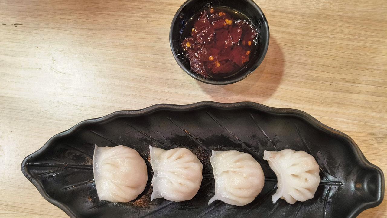 The prawn dumplings are served with chilli oil. PICS/PHORUM PANDYA 