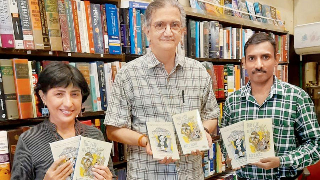 Raju Z Moray (centre) launches his book illustrated by Farzana Cooper (left) 