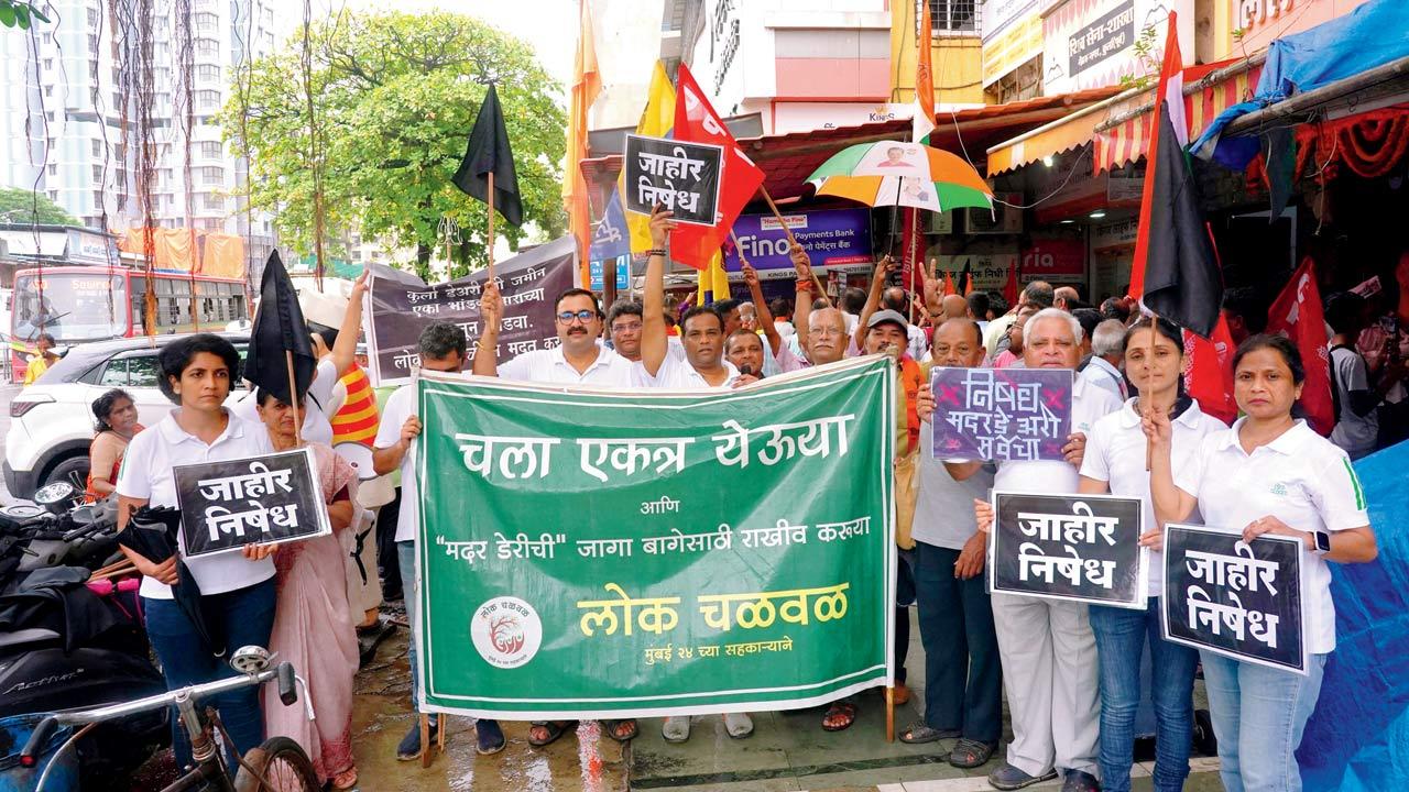 Residents protest against the survey of the Mother Dairy land in Kurla for the Dharavi redevelopment project on July 26. Pic/Aditi Haralkar