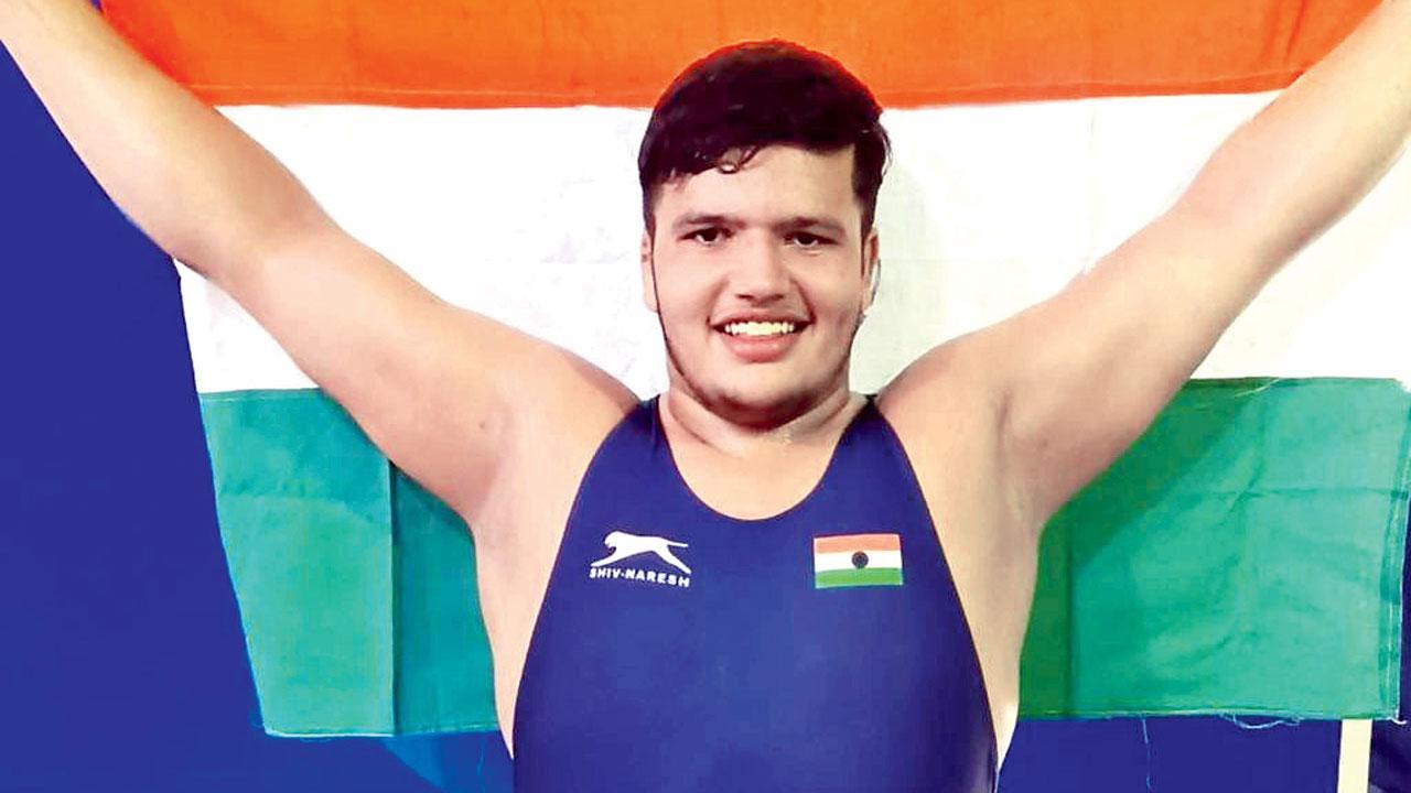 India wrestler Dahiya wins 110kg bronze