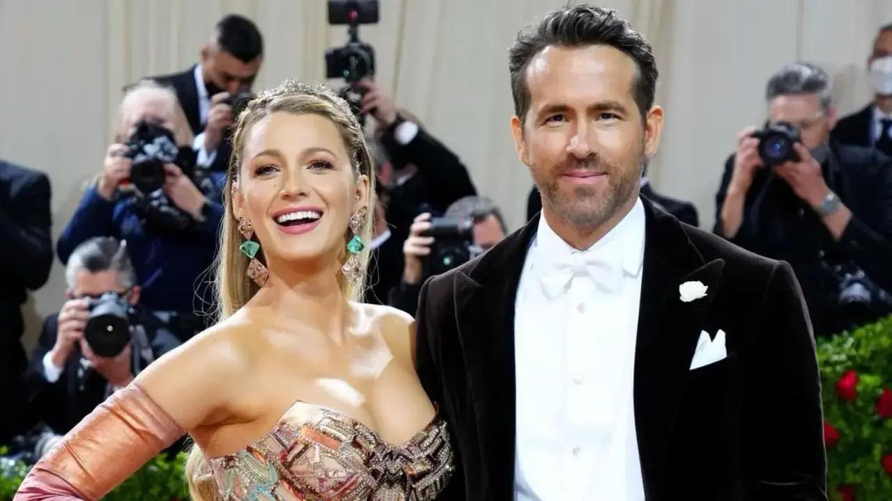 Blake Lively and Ryan Reynolds ignore the drama with a sweet kiss at Taylor Swift's party