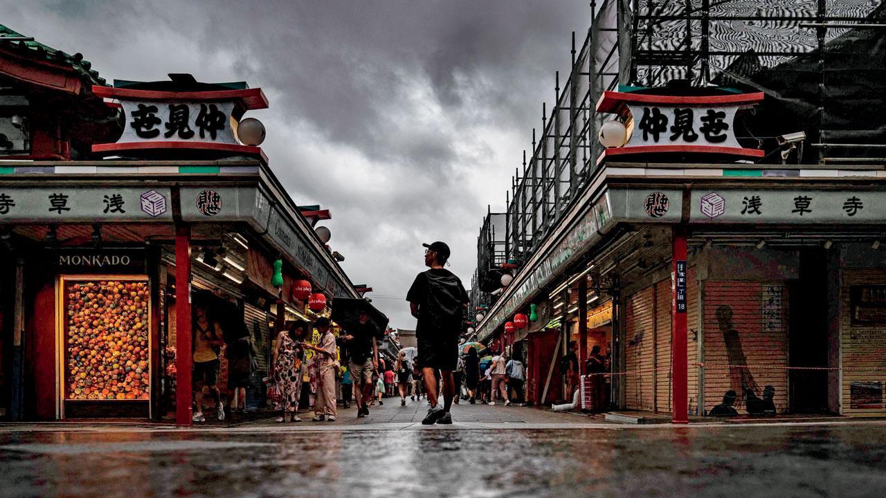 Japan orders evacuations as a typhoon approaches