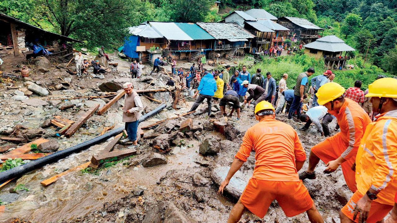 NDRF during search  and rescue op after a cloudburst near Shimla