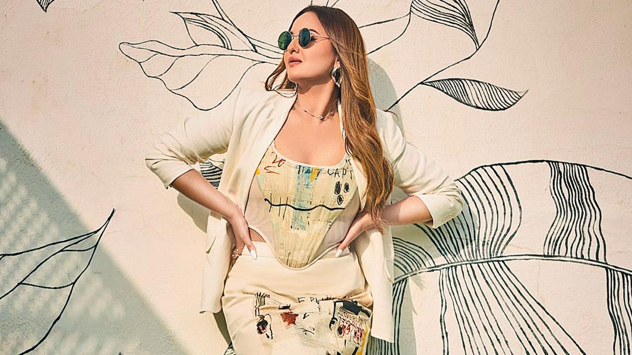 Sonakshi Sinha pairs her outfit with a white blazer for a semi-formal look