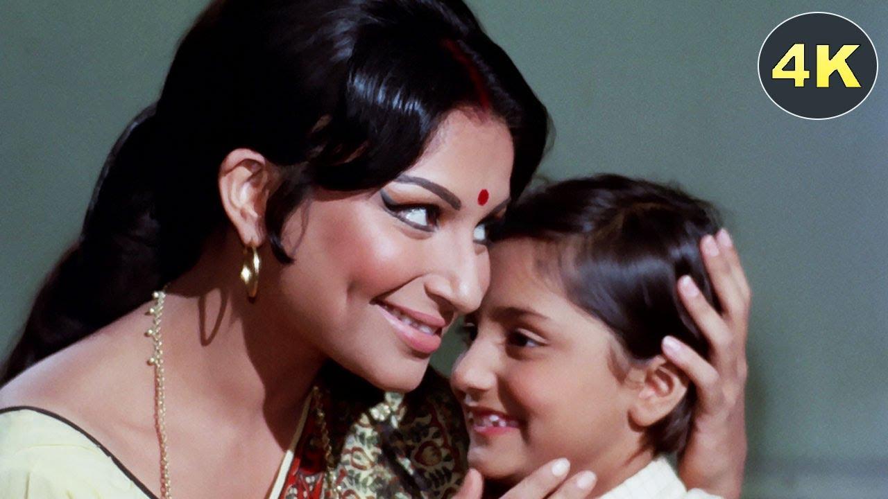 Bada Natkhat Hai Re  
From Amar Prem, this song is sung by a mother who lovingly recalls Krishna’s mischievous deeds as a child. It portrays Krishna’s playful nature and the affection he inspires in those who adore him