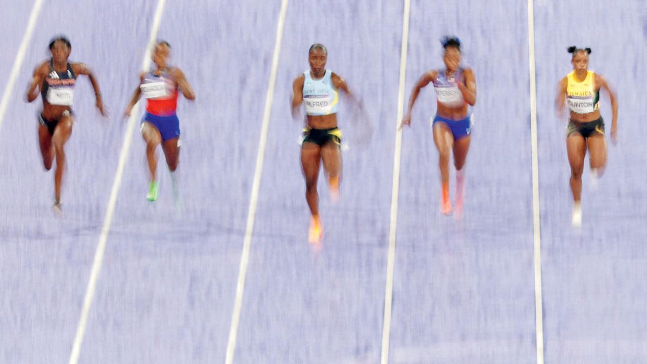 St Lucia’s Julien Alfred (centre) during the 100m final on Saturday