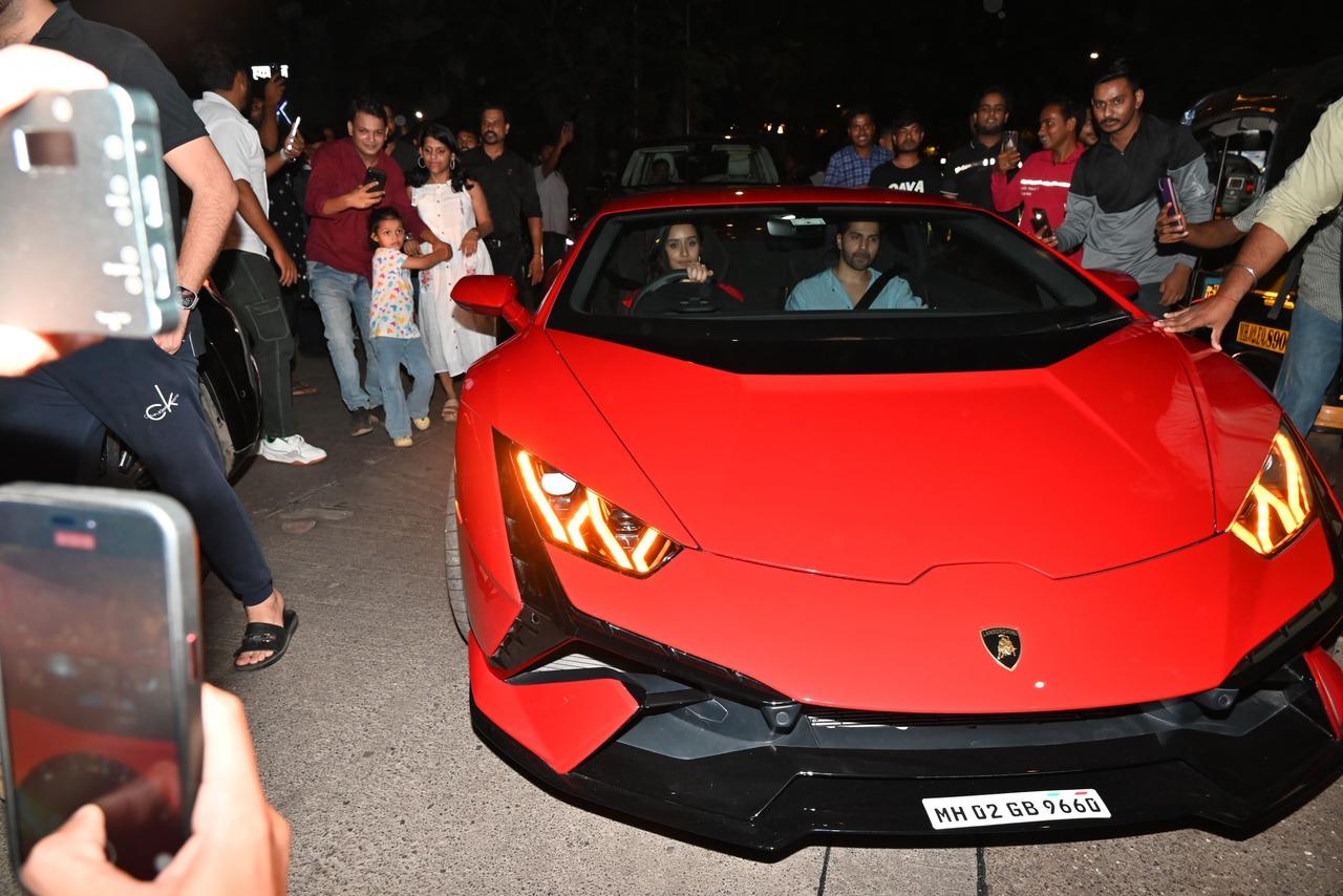 While Varun Dhawan sported a blue shirt, Shraddha's red top stole the spotlight