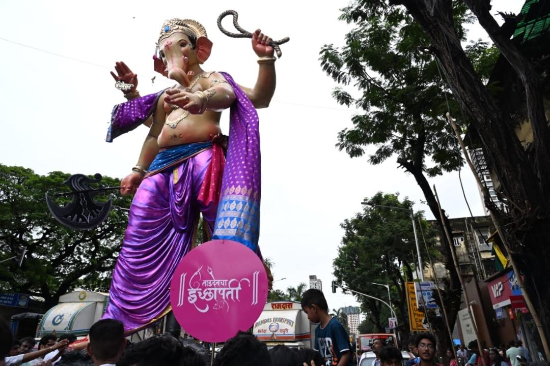 The idol of ''Tardeocha Icchapurti' pandal leaves from a Parel workshop on Sunday
