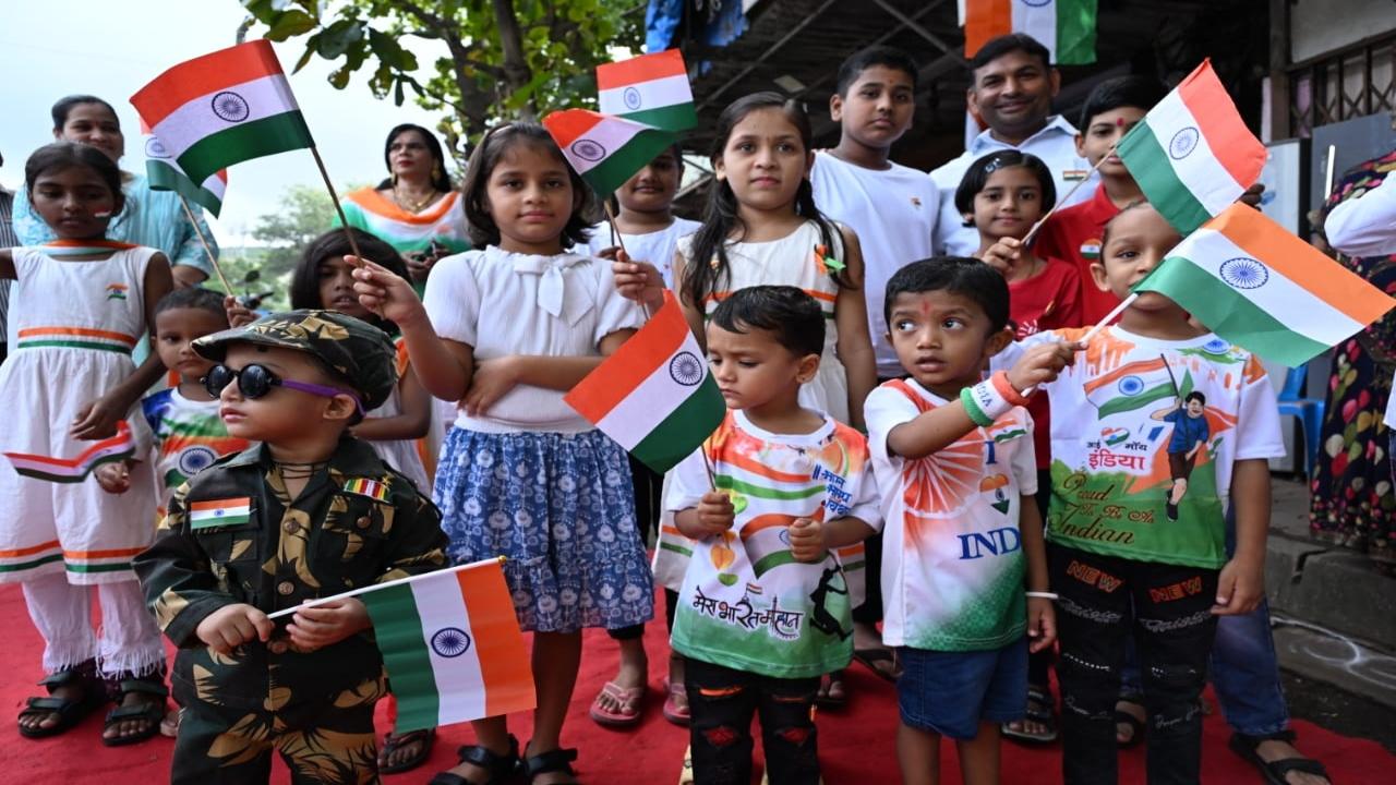 Kids dressed up in the colours of the national flag, holding the tricolour, celebrate India`s 78th Independence Day in Goregaon on Thursday.