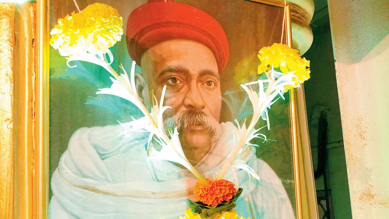 A photo of Tilak hangs in the Keshavji Naik chawl Ganesh pandal