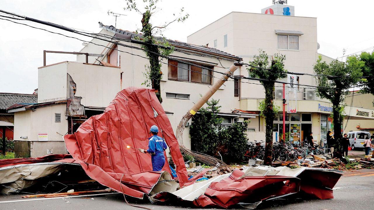 Typhoon lashes Japan with torrential rains, strong winds