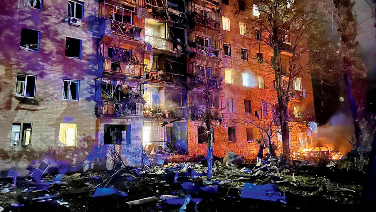 A fire in a building following a missile attack in Kursk, Russia, on Sunday. Pic/AFP