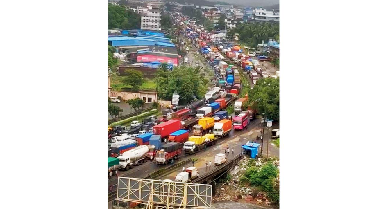 The truck overturned on the Gujarat-bound side of the Mumbai-Ahmedabad highway in Vasai early on Saturday, halting traffic for hours